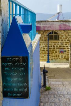 Safed, Israel - March 10, 2020: View of a donation box in the Jewish Quarter of the old city of Safed (Tzfat), Israel