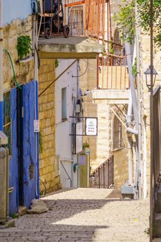 Safed, Israel - March 10, 2020: View of an alley in the Jewish Quarter of the old city of Safed (Tzfat), Israel