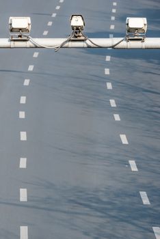 Speed cameras monitoring traffic road above empty road in Chengdu, Sichuan province, China