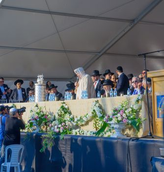 NETIVOT, ISRAEL - JANUARY 13, 2016: Rabbi Baba Baruch speaks to the crowd in the annual hillula of his father (Baba Sali) memory. In Netivot, Israel