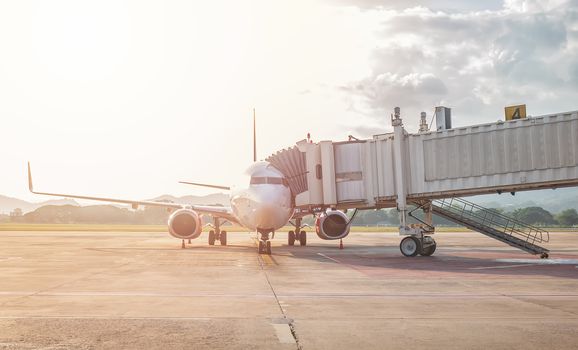 jet bridge or aerobridge connects the airplane’s door to the airport terminal, shelters for passengers disembark from an aircraft to the airport gate