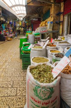 ACRE, ISRAEL - JANUARY 18, 2016: Market scene in the old city, with sellers and shoppers, in Acre, Israel