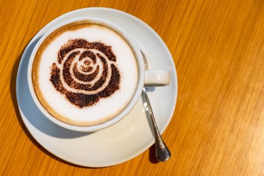 Cup of cappuccino close-up on a table top view