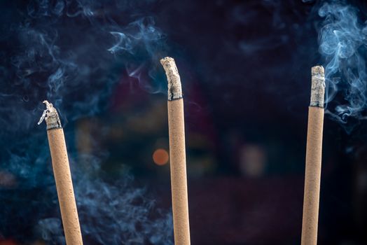 Incense sticks burning in a taoist temple in QingChengShan, Sichuan Province, China