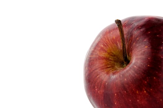 detail of red Apple fruit from close isolated on white background