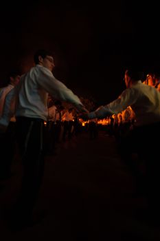 HAIFA, ISRAEL - MAY 01, 2010: Orthodox Jews dance around a bonfire to celebrate the Jewish holiday of Lad-BaOmer, in Haifa, Israel