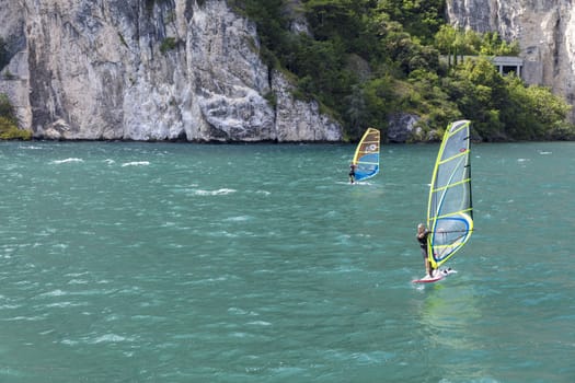 Lake Garda, Italy, August 2019, windsurfing on the lake