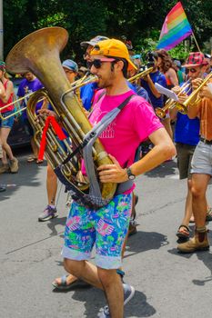 HAIFA, Israel - June 30, 2017: People play music, as part of the annual pride parade of the LGBT community, in the streets of Haifa, Israel