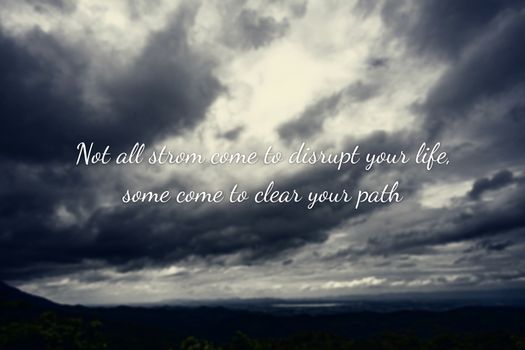 typography motivational messages and inspirational quotes. phrase not all storms come to disrupt your life some come to clear your path. blur rainy cloud background.