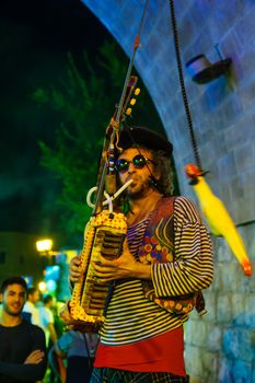 SAFED, ISRAEL - AUGUST 23, 2017: Scene of the Klezmer Festival, with street musicians playing, in Safed (Tzfat), Israel. Its the 30th annual traditional Jewish festival in the public streets of Safed