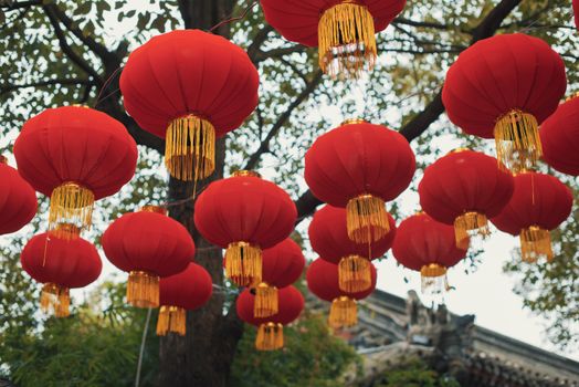 Red chinese lanterns hanging in the street for the chinese new year