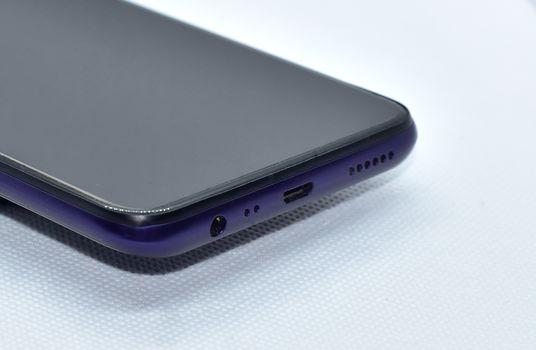 Mobile Phone Outline From bottom view where we can see audio jack, charging port and speaker windows