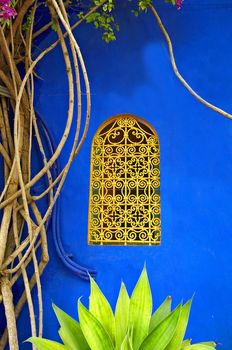 One of the many decorative windows in the houses and gardens in Marrakech