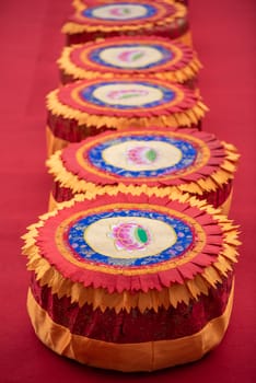 Red buddhist monk cushions sits in a buddhist temple in Chengdu, Sichuan province, China