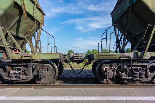 Connection of two railway wagons at the loading station