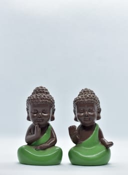 Two cute monk figures attract attention and also meaningful with modern simplicity