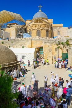 JERUSALEM, ISRAEL - APRIL 29, 2016: A crowd of Ethiopian Pilgrims gather in the Deir Es-Sultan, part of the church of the Holy Sepulcher, in Orthodox Good Friday. The old city of Jerusalem, Israel