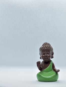 One cute monk figure attract attention and also meaningful with modern simplicity