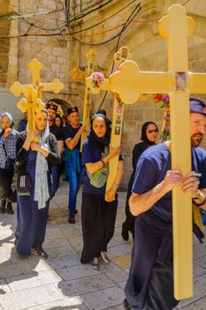 JERUSALEM, ISRAEL - APRIL 29, 2016: An Orthodox Good Friday scene in the yard of the church of the Holy Sepulcher, with pilgrims arriving. The old city of Jerusalem, Israel