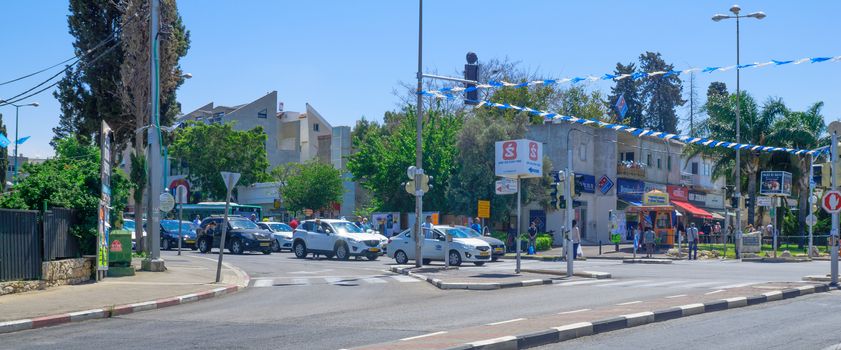 HAIFA, ISRAEL - MAY 11, 2016:  Scene of Yom Hazikaron (Israel Memorial Day for its soldiers), with people and traffic observe a two-minute standstill to a sound of a siren. Haifa, Israel