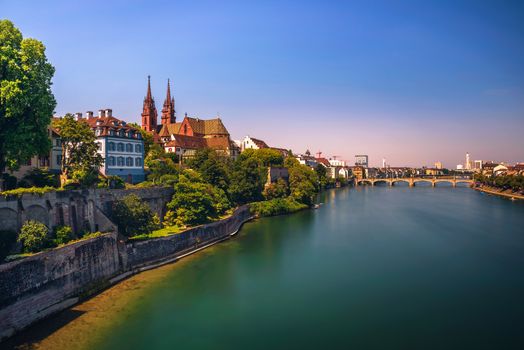View over the Old Town of Basel, Munster cathedral and the Rhine river in Switzerland. Long exposure.