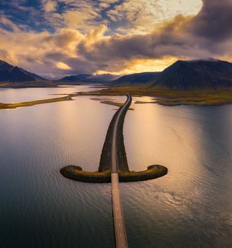 Aerial view of an iconic bridge located on the Snaefellsnes peninsula in west Iceland at sunset.