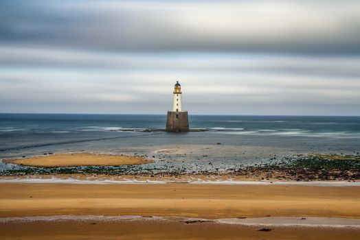 Rattray Head Lighthouse on the north east coast of Scotland, United Kingdom. Long exposure.