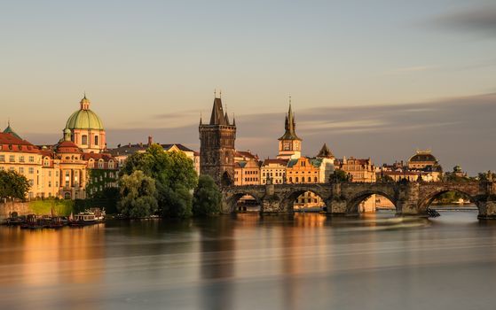 Charles bridge in the old town of Prague at sunset. Long exposure.