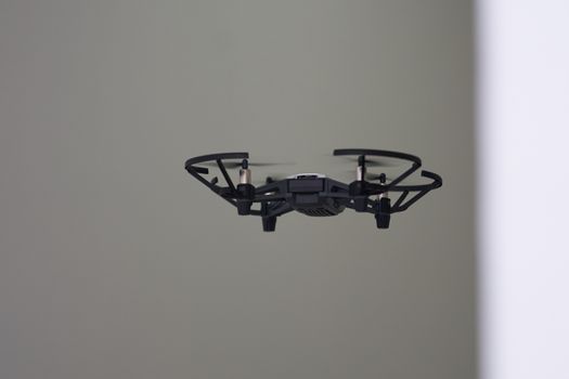 Back aspect of UAV or drone fly in room