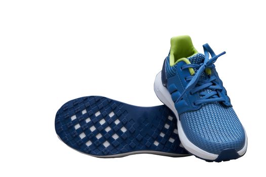 blue  sport shoes with shoes sole base on white isolated background