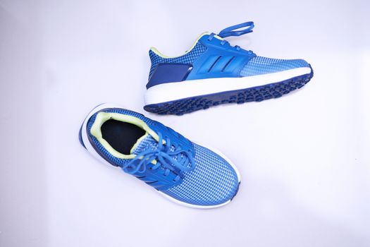 Blue sport shoes  on white isolated  background