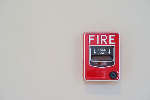 Fire or smoke alarm switch on wall