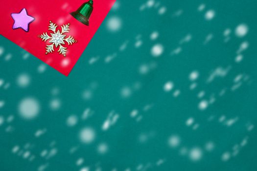 Green bell ,snow flake and star on red and green background with copy space for new year and christmas time with snow fall