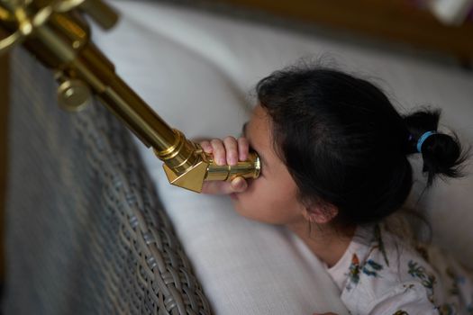 Girl use telescope