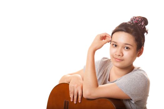 young beautiful asian woman with her guitar