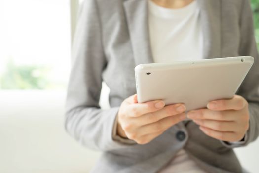 Woman using a tablet computer