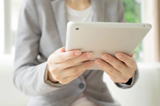 Woman using a tablet computer