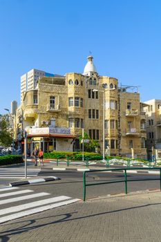 HAIFA, ISRAEL - OCTOBER 27, 2017: Historical houses in mixed Arab and International (Bauhaus) style, with locals and visitors, in Haifa, Israel