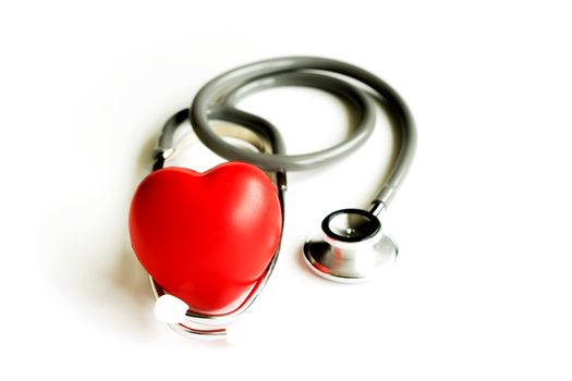 Stethoscope with heart isolated on white background