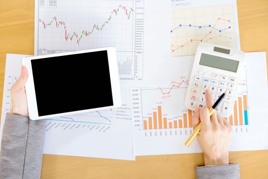 Close-up Of Businesswoman With Digital Tablet And Document