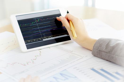 Close-up Of Businesswoman With Digital Tablet And Document