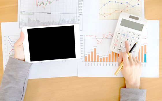 Close-up Of Businesswoman With Digital Tablet And Document