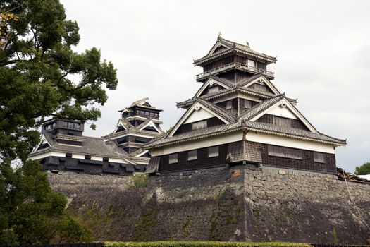 KUMAMOTO - DEC,16 : Landscape of Kumamoto castle, a hilltop Japanese castle located in Kumamoto Prefecture on the island of Kyushu.The main castle was damaged by earthquake and now repairing. JAPAN DEC,16 2016