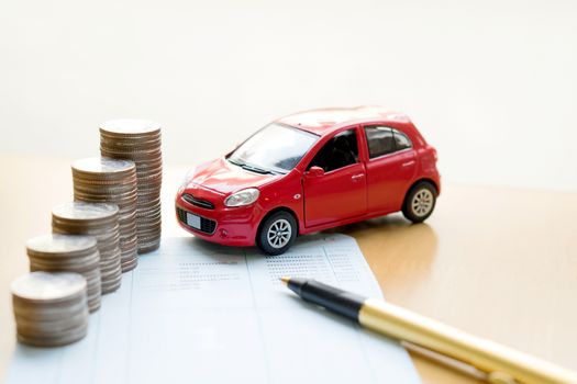 money, pile coin with account book and car, concept