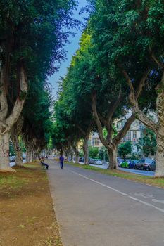 TEL-AVIV, ISRAEL - NOVEMBER 13, 2017: Scene of Chen boulevard, with locals and visitors, in Tel-Aviv, Israel