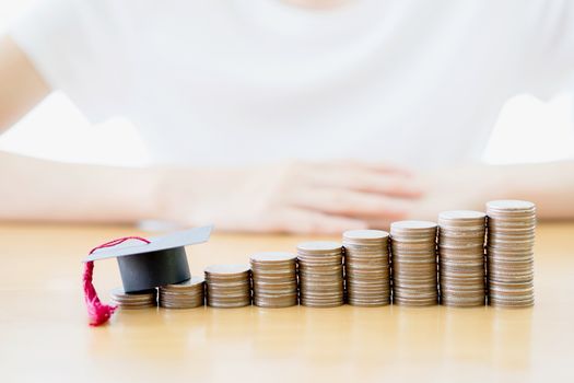 Women saving education coins