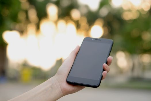 Woman using her Mobile Phone