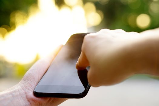 Woman using her Mobile Phone