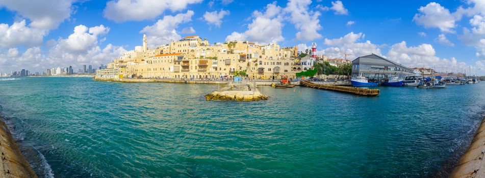 TEL-AVIV, ISRAEL - MAY 27, 2016: Panoramic view of the Jaffa port, the old city of Jaffa, and Tel-Aviv coastal skyline, with locals and visitors, now part of Tel-Aviv Yafo, Israel