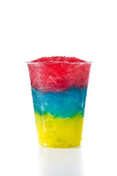 Colorful slushie of different flavors with straw in plastic cup isolated on white background.
